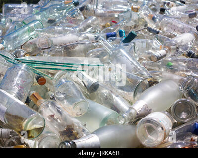 Piles of glass ready for recycling at a traditional glass blowing factory Stock Photo