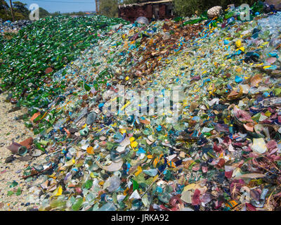 Piles of glass ready for recycling at a traditional glass blowing factory Stock Photo