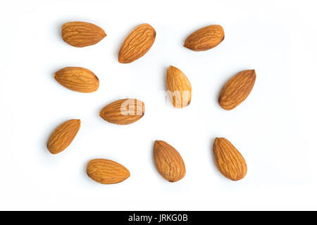 Almond nuts on isolated white background Stock Photo