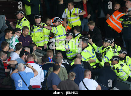 Police contain Hannover 96 ultras in the stands during the pre-season friendly match at Turf Moor, Burnley. Stock Photo