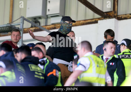 Hannover 96 ultras in the stands during the pre-season friendly match at Turf Moor, Burnley. Stock Photo