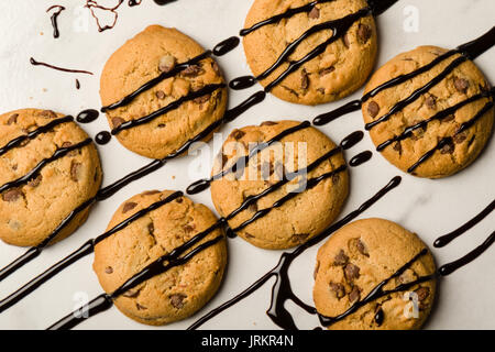 brown chocolate biscuits with syrup on white table Stock Photo