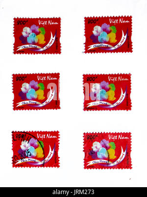 VIETNAM - CIRCA 2004: A stamp printed in Vietnam shows five colorful lotus flower, circa 2004 Stock Photo