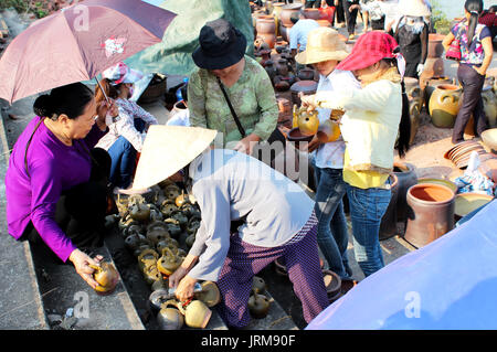 HAI DUONG, VIETNAM, AUGUST, 12: people at the ceramics market on August, 12, 2014 in Hai Duong, Vietnam. Stock Photo