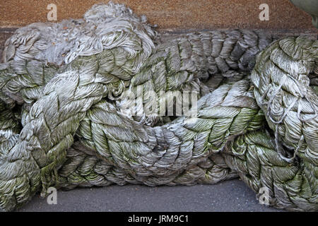 Old thick mooring rope at Yokohama Port in Japan Stock Photo