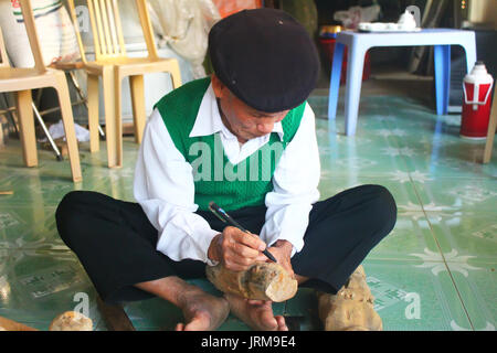 HAI DUONG, VIETNAM, DECEMBER, 31: artisans make water puppetry in Vietnam on december, 31, 2014 in Hai Duong, Vietnam Stock Photo