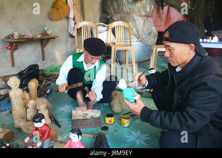 HAI DUONG, VIETNAM, DECEMBER, 31: artisans make water puppetry in Vietnam on december, 31, 2014 in Hai Duong, Vietnam Stock Photo