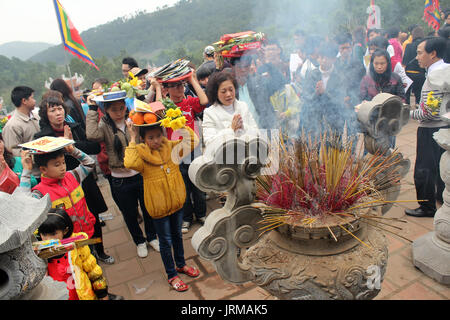 HAI DUONG, VIETNAM, September 19: people to tempel burning incense ceremony for luck on September 19, 2013 in Hai Duong, Vietnam. pray for luck from t Stock Photo