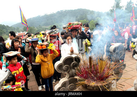 HAI DUONG, VIETNAM, September 19: people to tempel burning incense ceremony for luck on September 19, 2013 in Hai Duong, Vietnam. pray for luck from t Stock Photo