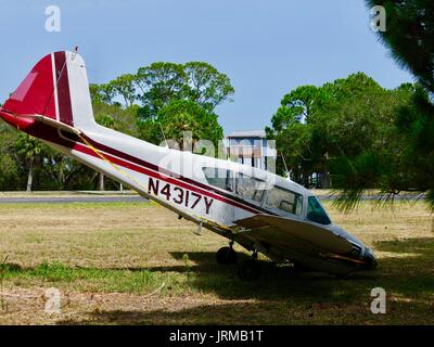 Piper PA 23 160 Apache damaged aircraft, runway overrun on 16 June 2017, no injuries, twin engine small plane, nose down. Cedar Key, Florida, USA. Stock Photo