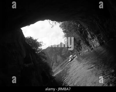 NINH BINH, VIETNAM, JULY, 20: Unidentified tourists in Trang An  on JULY, 20, 2013. Trang An is the scenic area, ranked special of Vietnam. Stock Photo