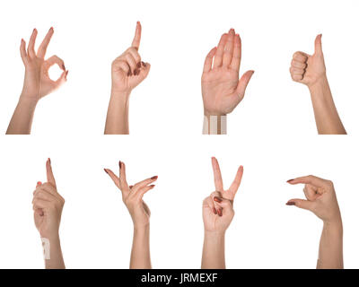 Beautiful and graceful female hand on a white background shows different gestures. Stock Photo
