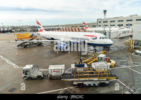 British Airways aircraft on tarmac, Terminal 5, Heathrow airport, London, UK Stock Photo