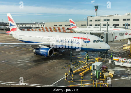 British Airways aircraft on tarmac, Terminal 5, Heathrow airport, London, UK Stock Photo