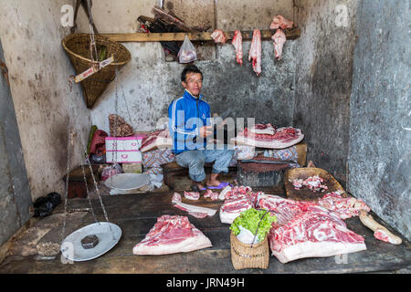 Butcher selling meat, Mawsynram, Meghalaya, India Stock Photo