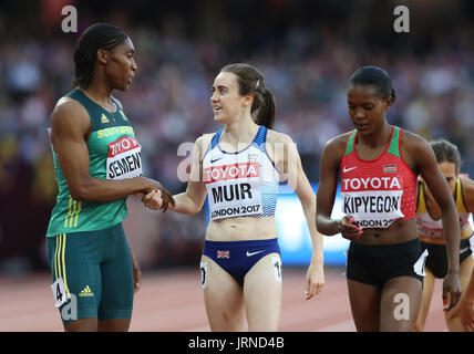 South Africa's Caster Semenya (left) shakes hands with Great Britain's Laura Muir (centre) during day two of the 2017 IAAF World Championships at the London Stadium. Stock Photo