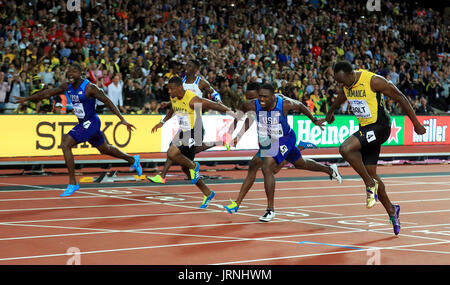 USA's Justin Gatlin (left) wins the Men's 100m Final ahead of Christian Coleman (5) and Jamaica's Usain Bolt in third (right) during day two of the 2017 IAAF World Championships at the London Stadium. Stock Photo