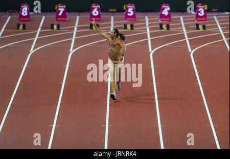 London, 2017 August 05. A streaker with 'Peace + Love' written on his chest runs down the track at the IAAF World Championships London 2017. © Paul Davey/Alamy Live News Stock Photo