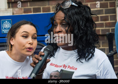London, UK. 4th Aug, 2017. London, UK. 4th August 2017. A cousin and the mother of Jermaine Baker, shot by police in December 2015, speaks at the rally at Tottenham Police Station remembering her father on the sixth anniversary of his killing by police, and also the police killing of other members of the Tottenham community - Cynthia Jarrett, Joy Gardner, Roger Sylvester, Mark Duggan and Jermaine Baker and the recent murders of Rashan Charles, Darren Cumberbatch and Edson Da Costa. Led by Stafford Scott, there was poetry, a minute of silence and speeches from family members as well as local Stock Photo