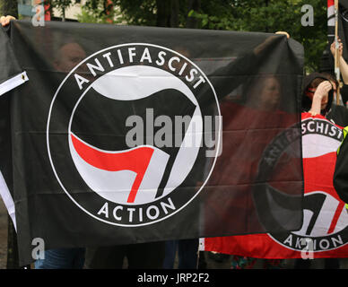 Belfast, UK. 06th Aug, 2017. A group of anti fascists conduct a counter protest Credit: Conall Kearney/Alamy Live News Stock Photo