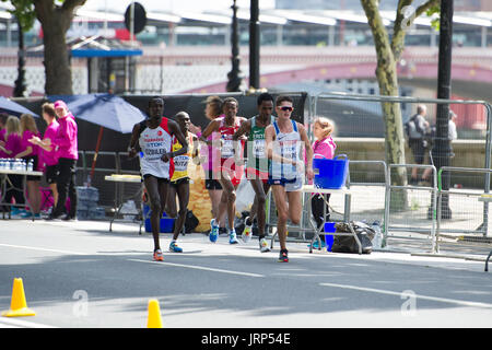 London, UK. 6th August, 2017. Callum Hawkins (Great Britain) takes a water refreshment, leading Amanuel Mesel (Eritrea), Kaan Kigen Ozbilen (Turkey), Shumi Dechasa (Bahrain) and Munyo Mutai (Uganda)  at the IAAF World Athletics Championships Men's Marathon Race Credit: Phil Swallow Photography/Alamy Live News Stock Photo