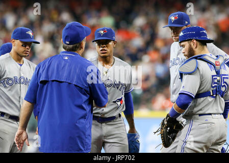 Houston, USA 06th Aug, 2017 Toronto Blue Jays manager John Gibbons (5) visits the mound to relieve Toronto Blue Jays starting pitcher Marcus Stroman (6) in the seventh inning during the MLB game between the Toronto Blue Jays and the Houston Astros at Minute Maid Park in Houston, TX. Credit: John Glaser/Cal Sport Media/Alamy Live News Stock Photo