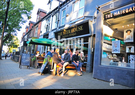 Friends drinking at pub on Ecclesall Road Sheffield Stock Photo