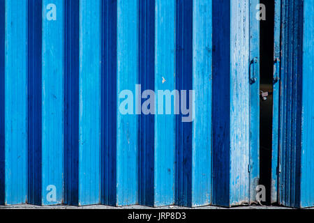 Blue painted folding door Stock Photo