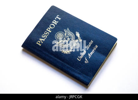 Blue US passport on a white background Stock Photo