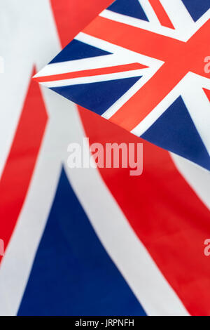 Clustered mini Union Jack flags. British patriotism, being patriotic, celebrating Brit way of life, Rule Britannia, Union Jack abstract, Made in UK. Stock Photo