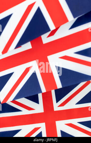 Clustered mini Union Jack flags. British patriots, being patriotic, celebrating Brit way of life, Rule Britannia, Union Jack abstract, Made in Britain Stock Photo