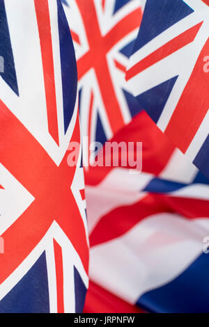 Clustered mini Union Jack flags. British patriots, being patriotic, celebrating Brit way of life, Rule Britannia, Union Jack abstract, Made in Britain Stock Photo