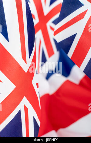 Clustered mini Union Jack flags. British patriots, being patriotic, celebrating Brit way of life, Rule Britannia, Union Jack abstract, Made in Britain Stock Photo