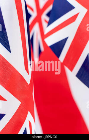 Clustered mini Union Jack flags. British patriots, being patriotic, celebrating Brit way of life, Rule Britannia, Union Jack abstract, Made in Britain Stock Photo