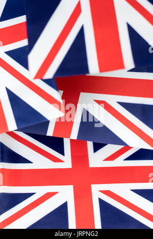 Clustered mini Union Jack flags. British patriots, being patriotic, celebrating Brit way of life, Rule Britannia, Union Jack abstract, Made in Britain Stock Photo