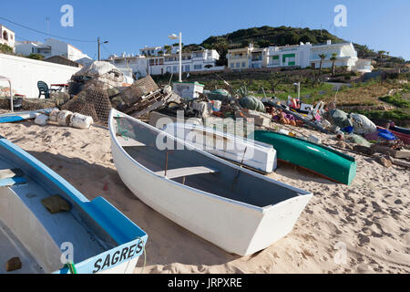 Salema, Portugal: Fishing boats beached along Praia da Salema Stock Photo