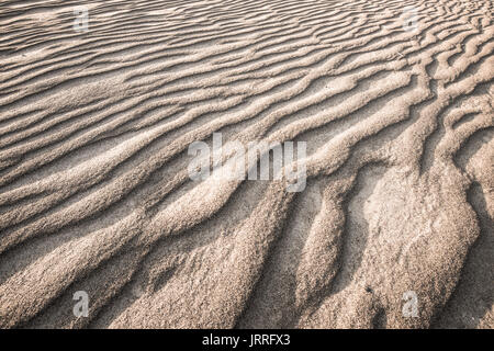 ripples of sand, textured background Stock Photo