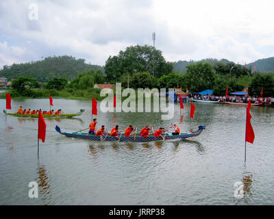 HAI DUONG, VIETNAM, March 2: People race the traditional boat on lake on March 2, 2013 in Kiep Bac – Con Son festival, Chi Linh, Hai Duong, Vietnam. K Stock Photo