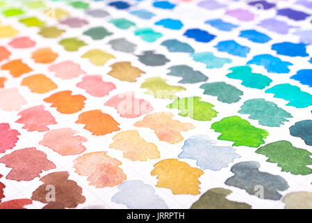 Watercolors in green, turquoise and blue on paper Stock Photo