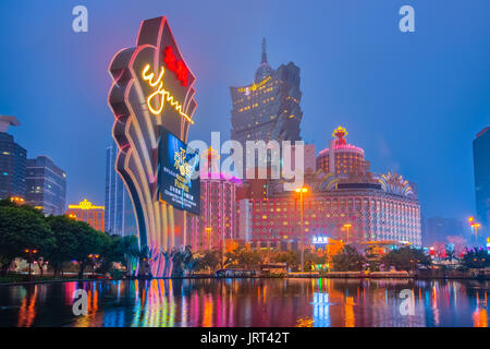 Macao, China - March 12, 2016: Macao cityscape at night with landmark buildings Stock Photo