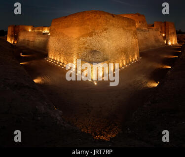 A blue hour/night shot of the old 16th century fort (Qala'at al Bahrain) Stock Photo