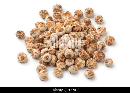 Heap of Chufa nuts on white background Stock Photo