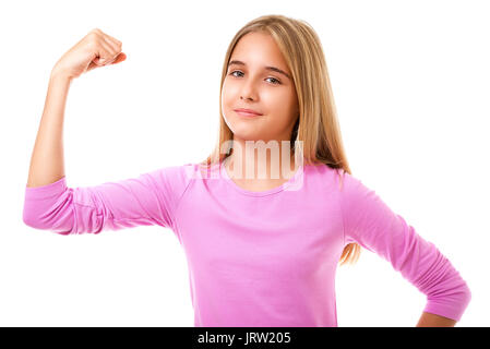 Girl power concept -  young teen girl showing her muscular arm for feminine and independent strength,studio shot Stock Photo