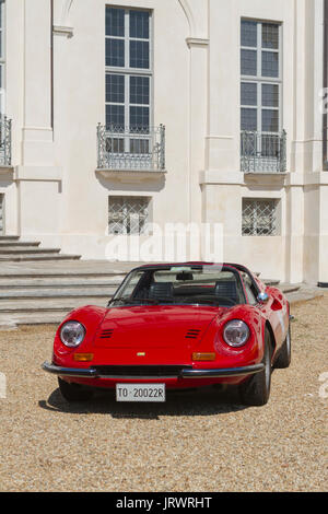 A Ferrari Dino GT in front of Stupinigi castle. Vintage cars and sportscar on exhibition in Torino during Parco Valentino car show. Stock Photo