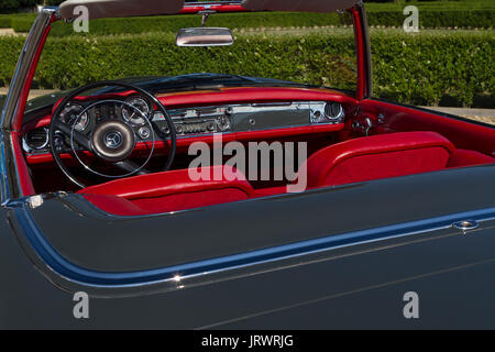Interior view and dashboard of Mercedes 230 SL. Vintage cars and sportscar on exhibition in Torino during Parco Valentino car show. Stock Photo