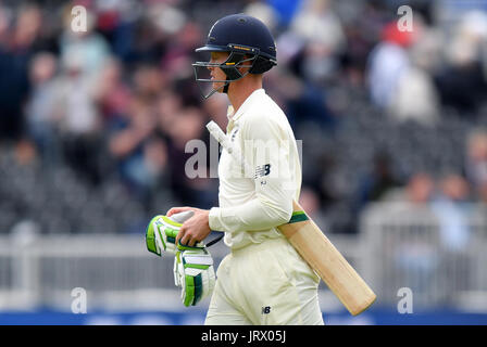 England's Keaton Jennings walks off after being dismissed during day three of the Fourth Investec Test at Emirates Old Trafford, Manchester. Stock Photo