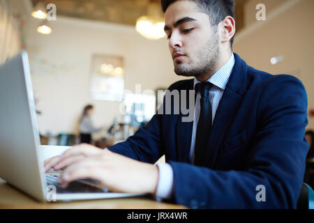 Concentrating on job search Stock Photo