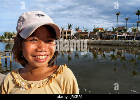 Nice girl up the Dragon boat cuise on the river Huong (Perfume River). Vietnam. Dragon head and excursion boat, Song Huong or Huong Giang or Perfume R Stock Photo