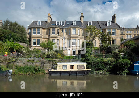 Houses in Widcombe, Bath, UK that have moorings on the Kennet & Avon Canal that runs at the bottom of their gardens. Stock Photo