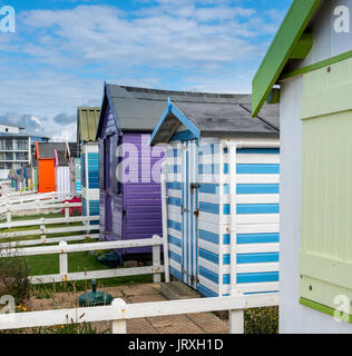 Colorful beach side huts on Devon coast of England Stock Photo